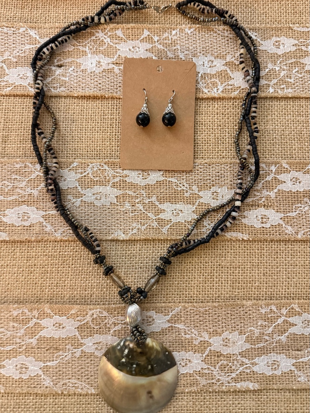 Handcrafted Black and Cream Shell Pendant Necklace with Matching Earrings